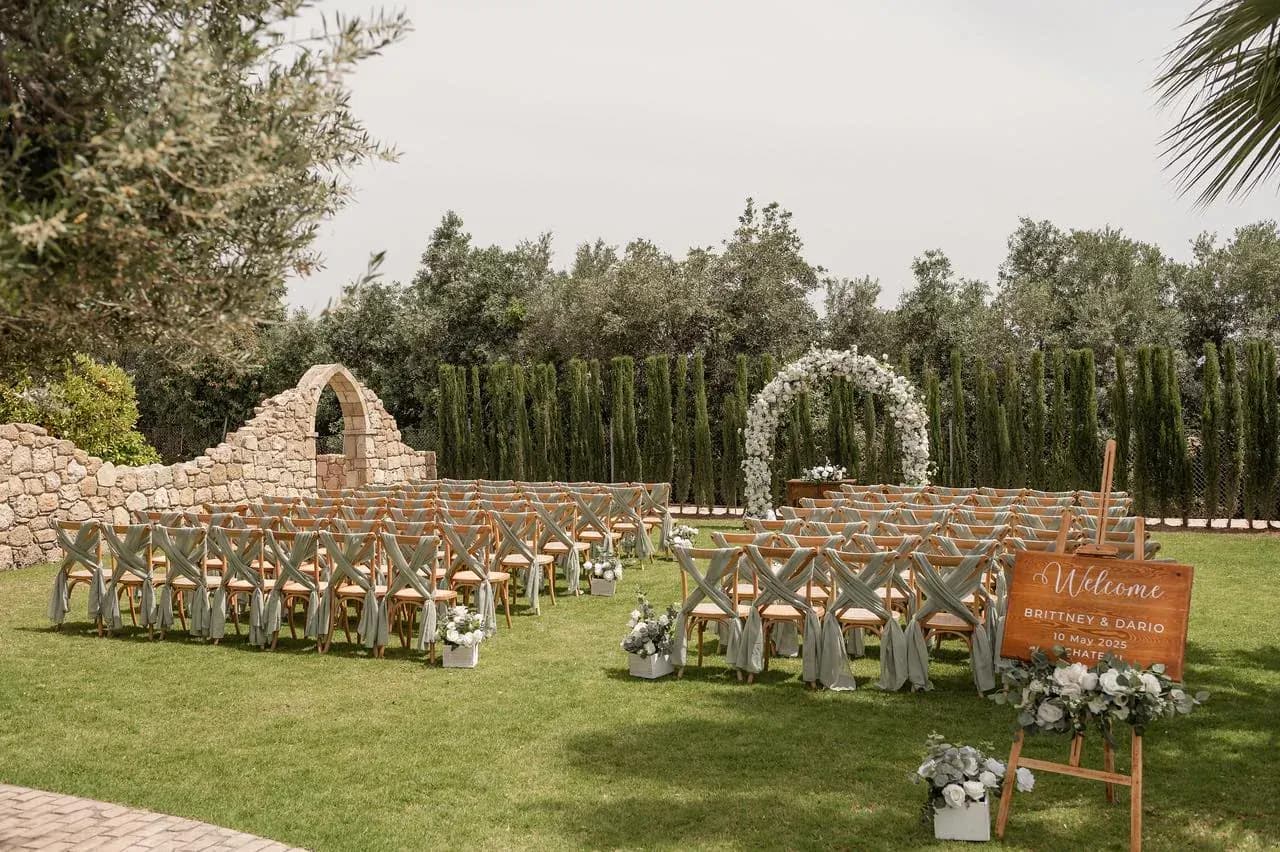 The Lawn ceremony space prepared for an outdoor wedding at L'Chateau